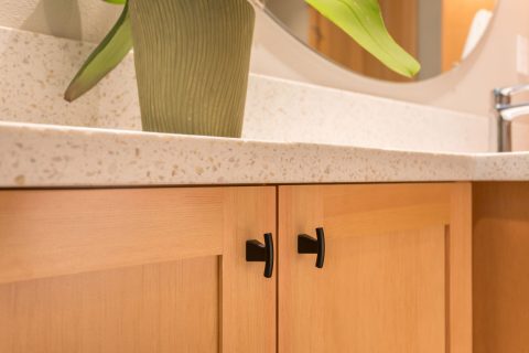 Light wood shaker-style custom cabinetry with white and gray speckled countertops, jack and jill updated bathroom remodel - Henderer Design + Build, Corvallis OR