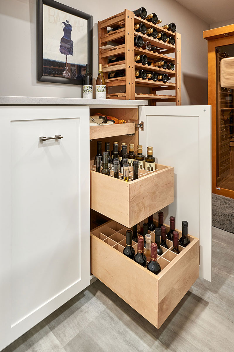 Basement remodel includes closet and cabinetry design. Custom home remodel from Henderer Design + Build + Remodel