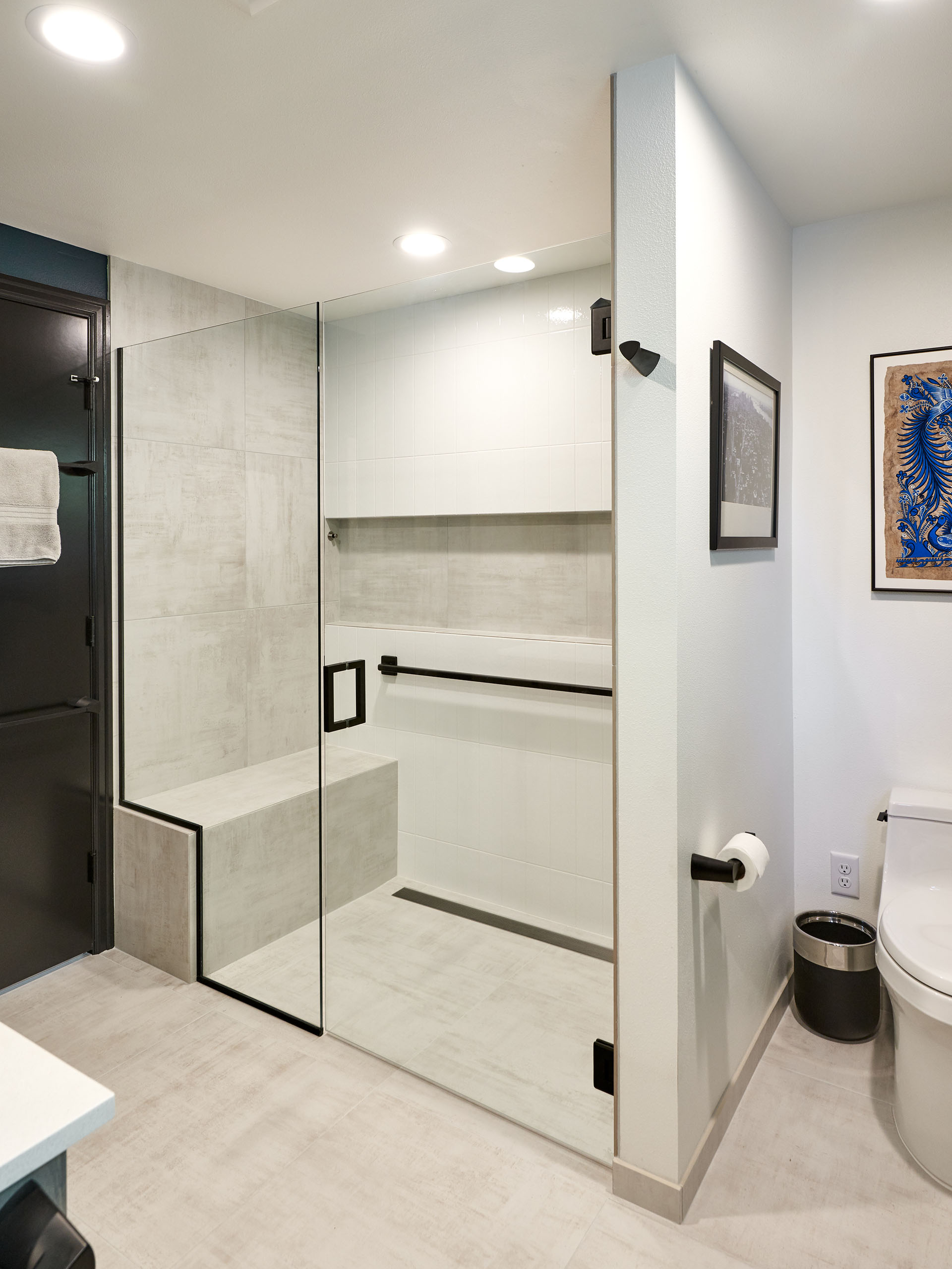 universal design and your forever home - aging in place curbless shower with built in bench - henderer design and build
