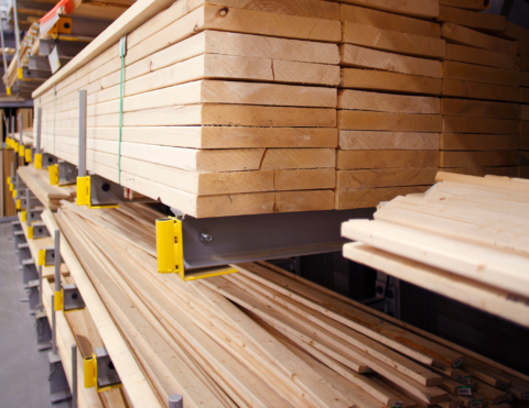 Material costs and lead times. lumber stacked on hardware shelves.