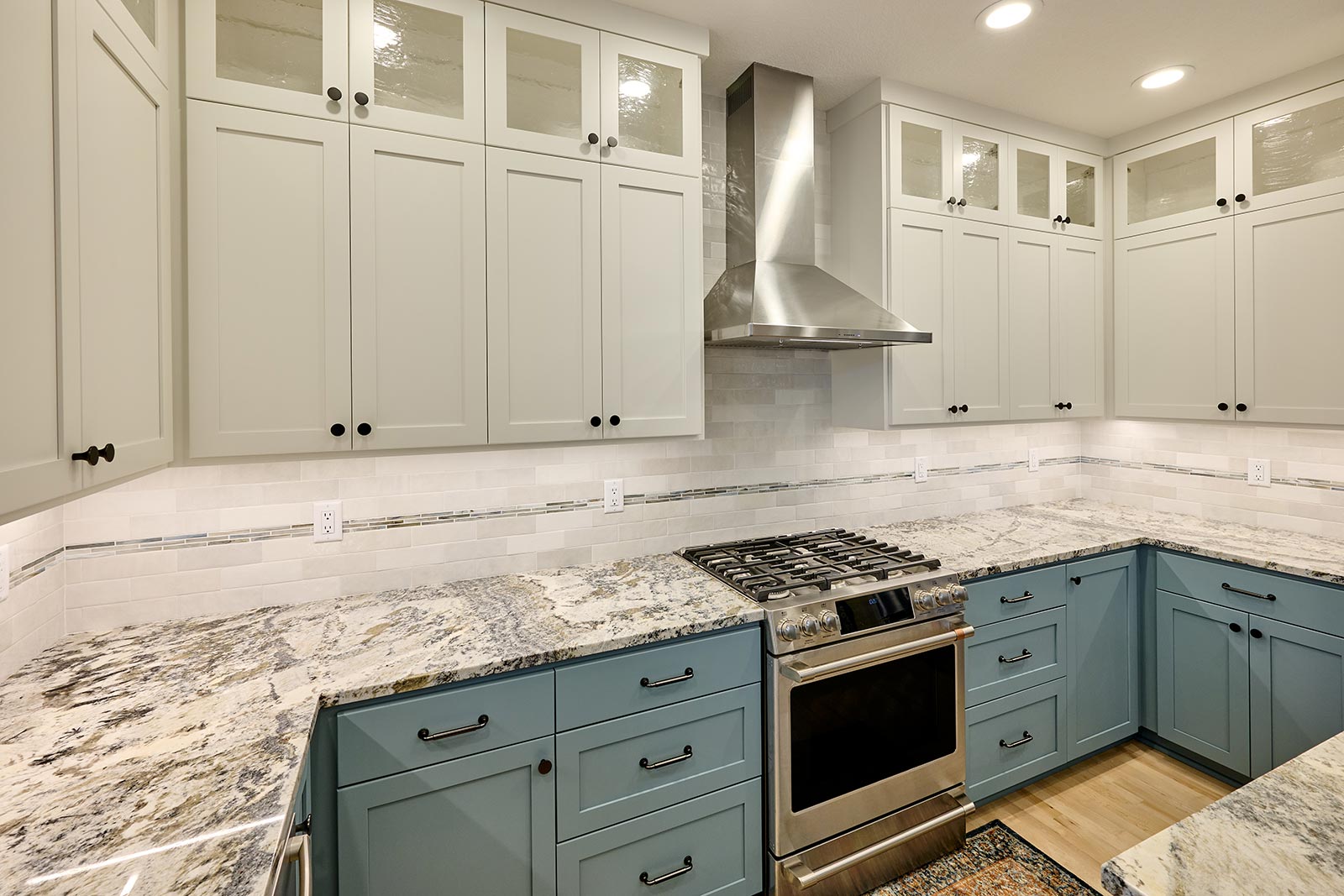 Contemporary kitchen remodel. New custom cabinets in blue. Henderer Design + Build + Remodel